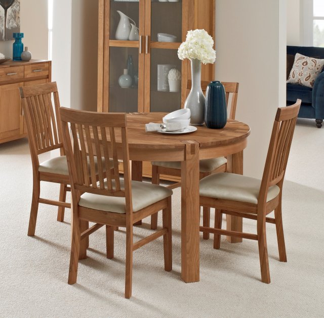 Living Homes Collection Regis Oak Round Extending Dining Table 4 Living Homes Collection Regis Oak Round Extending Dining Table 4 Fabric Chairs